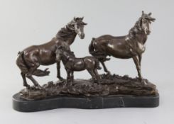 A modern bronze group of a stallion, mare and foal, on marble plinth, length 16in.