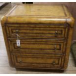 A leather bound chest of drawers, W.66cm