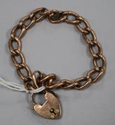 A 9ct gold oval link bracelet with heart shaped padlock clasp, gross 11.1 grams.