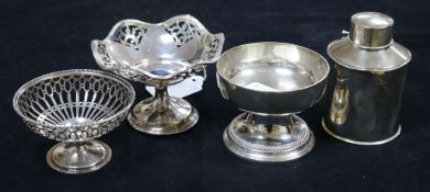 A silver tea caddy, a silver pedestal dish, a pierced white metal pedestal dish and another