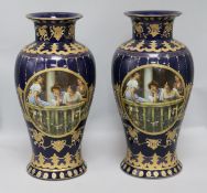 A pair of Vienna style vases