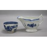 A Worcester blue and white sauceboat and a similar fisherman and cormorant teabowl, c.1770-90