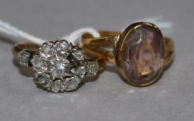 Two gold rings including a rose cut diamond cluster ring.