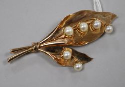 A 14ct gold and cultured pearl set foliate spray brooch, 8cm.