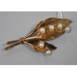 A 14ct gold and cultured pearl set foliate spray brooch, 8cm.