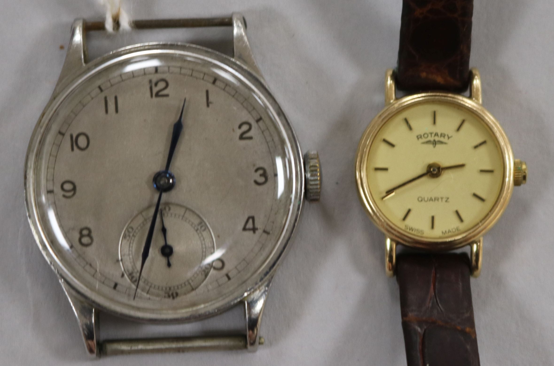 A gentleman's stainless steel Omega wristwatch, movement no. 8998523, c 1940 and a ladies' 9ct