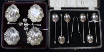 A set of six silver thistle terminal coffee spoons and tongs and a set of four Victorian silver