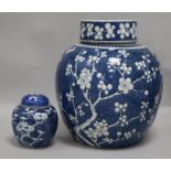 A large Chinese prunus jar and cover and another small jar