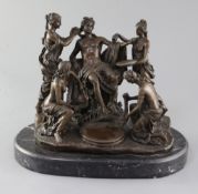 M. Mercie. A bronze group of a classical youth with female attendants, on marble plinth, width 12.