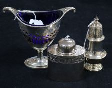 An Adam style silver sugar vase with blue glass liner, a small silver tea oval caddy and a large