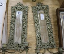 A French fan-shaped firescreen and a pair of brass girandole mirrors