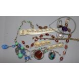 Mixed costume jewellery including amber necklace.