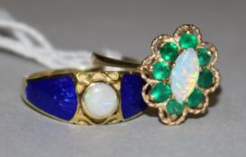 Two 9ct gold and white opal rings.