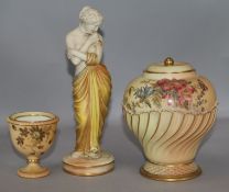 A Worcester classical figurine, blush pot and cover and small vase