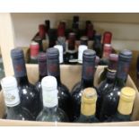 Thirty three assorted bottles of red and white wines including four Chateau Meyney, Saint Estephe,