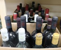 Thirty three assorted bottles of red and white wines including four Chateau Meyney, Saint Estephe,