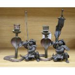 A pair of Japanese bronzed spelter figures of kneeling samurai and a pair of Indian cobra