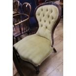 A Victorian mahogany button back nursing chair