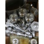 A pewter bowl, candlesticks, ice buckets, etc.