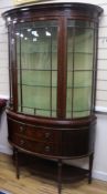 An Edwardian inlaid bow-front mahogany display cabinet, H.181cm