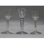 Three George II drinking glasses, with folded feet