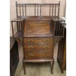 An Edwardian walnut student's bureau, W.84cm