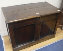 An early 18th century oak panelled coffer, W.93cm