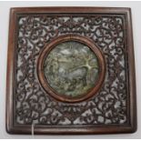 A Chinese rosewood framed soapstone plaque