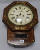 An early Victorian brass inset wall clock