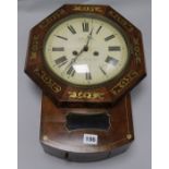 An early Victorian brass inset wall clock