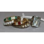 An 18ct gold gem set ring and four assorted 9ct gold rings.