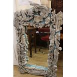 A carved silvered wood framed mirror, H.121cm