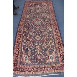 A Hamadan rug, 130 x 300cm