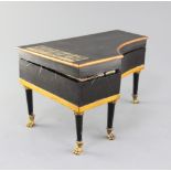 A 19th century French Palais Royale inlaid and ebonised musical necessaire, modelled in the form a