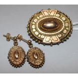 A Victorian yellow metal brooch and matching earrings.