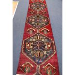 A Hamadan rug, 290 by 78cm