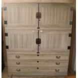 A Japanese paulena wood three part cabinet / linen press, W.167cm