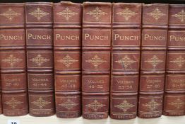 Punch, vols 1 - 100 in 25 books, quarto, half morocco, London 1841-73, 1875-91