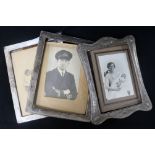 Three assorted early 20th century silver photograph frames, all approximately 24cm.