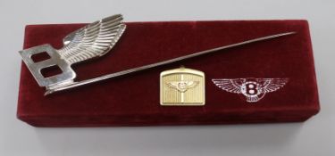 An 18ct gold Bentley key ring and Bentley letter opener in box.