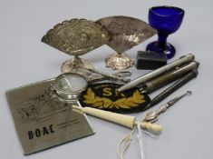 An S. R. Inspectors badge, a miniature, dominoes, menu holders, etc.