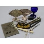 An S. R. Inspectors badge, a miniature, dominoes, menu holders, etc.