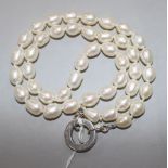 A single strand cultured pearl necklace with sterling silver clasp, 56cm