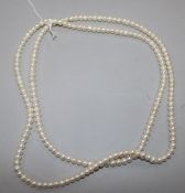 An opera length single strand cultured pearl necklace, 116cm.