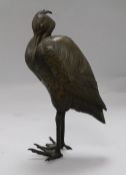 A Japanese bronze heron, signed, foot a.f.
