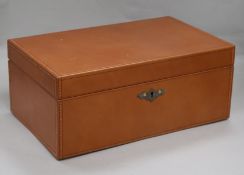 A stitched leather covered humidor