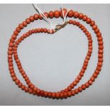 A single strand graduated coral bead necklace, 48cm.