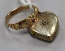 A late 19th/early 20th century gold and gem set ring and a diamond set heart shaped yellow metal.