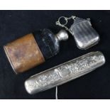 A silver purse, a silver mounted hip flask and a German silver toilet box.