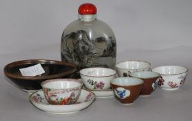 A collection of mixed Oriental ceramics and snuff bottles